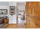 Inviting entryway features hardwood floors and a view into the dining area at 8836 E Phillips Pl, Centennial, CO 80112