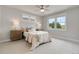Cozy bedroom with large windows, plush carpet, and stylish decor for a comfortable and inviting atmosphere at 3858 W 117Th Ct, Westminster, CO 80031