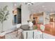 Dining area adjacent to kitchen with hardwood floors and modern decor at 3858 W 117Th Ct, Westminster, CO 80031