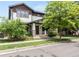 Charming two-story home with landscaped front yard, covered porch, and stone accents at 3858 W 117Th Ct, Westminster, CO 80031