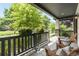 Relaxing front porch with Adirondack chairs, decorative plants, and a view of the neighborhood at 3858 W 117Th Ct, Westminster, CO 80031