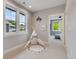 Bright playroom featuring a teepee, large windows, and a playful atmosphere perfect for activities at 3858 W 117Th Ct, Westminster, CO 80031