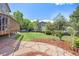 Serene backyard with mature trees, spacious deck, and inviting hot tub for ultimate relaxation at 4467 Trailside Ln, Castle Rock, CO 80109