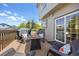 Relaxing outdoor deck area complete with a fire pit and grill at 4467 Trailside Ln, Castle Rock, CO 80109