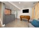 Finished game room with stylish flooring, bar, and entertainment area at 4467 Trailside Ln, Castle Rock, CO 80109