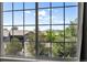 Scenic view of neighborhood and mountains through a multi-paned window at 4467 Trailside Ln, Castle Rock, CO 80109