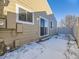 Small backyard with a snow covered ground and a privacy fence at 11860 Harrison St, Thornton, CO 80233