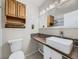 Updated bathroom with modern vanity, tile, and a shower at 11860 Harrison St, Thornton, CO 80233