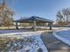 Park with covered picnic tables and walking path at 11860 Harrison St, Thornton, CO 80233