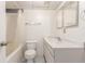 Bathroom showing sink, toilet and tub with shower at 17665 E Temple Dr, Aurora, CO 80015