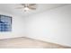 Bedroom featuring carpet, light neutral paint, ceiling fan, and natural light at 7743 S Jersey Way, Centennial, CO 80112