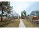 Path through the community park showing the landscaping and neighboring homes at 7743 S Jersey Way, Centennial, CO 80112