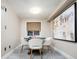 Dining area with modern lighting fixture at 7743 S Jersey Way, Centennial, CO 80112