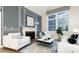 Inviting living room featuring a fireplace, stylish decor, and neutral color palette at 7743 S Jersey Way, Centennial, CO 80112