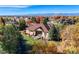 Aerial view of house showcasing backyard and mountain views at 449 Meadow View Pkwy, Erie, CO 80516