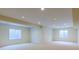 Large, unfinished basement with two windows at 449 Meadow View Pkwy, Erie, CO 80516