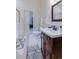 Guest bathroom with single vanity, toilet, and shower at 449 Meadow View Pkwy, Erie, CO 80516