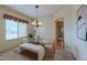 Elegant dining room featuring a chandelier and large windows at 449 Meadow View Pkwy, Erie, CO 80516