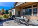 Outdoor patio with seating area and built-in grill at 449 Meadow View Pkwy, Erie, CO 80516