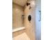 Large walk-in shower with tiled walls and a built-in seat at 449 Meadow View Pkwy, Erie, CO 80516