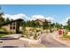 Community entrance featuring a gated entry and meticulously landscaped surroundings at 507 Red Thistle Dr, Highlands Ranch, CO 80126