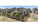 A stylish home featuring modern architecture, large windows, and well-maintained landscaping at 507 Red Thistle Dr, Highlands Ranch, CO 80126