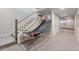 Hallway features stairs, and a basketball game setup to add fun and encourage physical activity at 507 Red Thistle Dr, Highlands Ranch, CO 80126