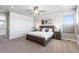 Bright bedroom with a ceiling fan, large window, and neutral decor at 507 Red Thistle Dr, Highlands Ranch, CO 80126