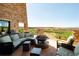 An expansive outdoor patio with comfortable seating and scenic views at 507 Red Thistle Dr, Highlands Ranch, CO 80126