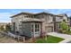 Beautiful home with large windows, neutral siding, and a two-car garage at 507 Red Thistle Dr, Highlands Ranch, CO 80126