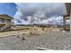 Spacious backyard features low maintenance landscaping and ample space at 483 Agoseris Way, Castle Rock, CO 80104