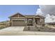 Attractive single-Gathering home with a two-car garage and low maintenance front yard at 483 Agoseris Way, Castle Rock, CO 80104