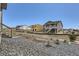 Street view of a new construction home with gravel landscaping at 483 Agoseris Way, Castle Rock, CO 80104