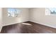 Sunlit room featuring a large window with wood-look floors at 14454 E Colorado Dr # 102, Aurora, CO 80012