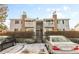 Exterior shot showcasing a well-maintained complex with balconies and parking at 14454 E Colorado Dr # 102, Aurora, CO 80012