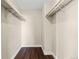 A walk-in closet featuring wood-look floors and storage at 14454 E Colorado Dr # 102, Aurora, CO 80012