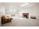 Finished basement with a brick fireplace and ample storage, perfect for recreation or entertainment at 6 Ivy Ln, Denver, CO 80220