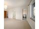Spacious room with carpet and views of an adjacent bathroom at 6 Ivy Ln, Denver, CO 80220