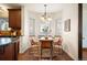 Charming breakfast nook features natural light and seating for four, perfect for casual meals at 6 Ivy Ln, Denver, CO 80220