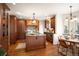 Spacious kitchen with a large island, stainless steel appliances, and a breakfast nook for casual dining at 6 Ivy Ln, Denver, CO 80220