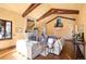 Bright and airy living room with a fireplace, hardwood floors, and a vaulted ceiling at 6 Ivy Ln, Denver, CO 80220