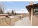 View of the home's balcony featuring wood flooring and a decorative metal railing at 6246 W 35Th Ave, Wheat Ridge, CO 80033