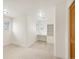 Neutral colored bedroom with built in shelving and desk area and two windows at 6246 W 35Th Ave, Wheat Ridge, CO 80033