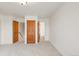 Neutral bedroom featuring wood doors and trim at 6246 W 35Th Ave, Wheat Ridge, CO 80033