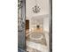 Stunning foyer view showcases decorative front doors, mosaic tile, chandelier, and open floor plan at 6246 W 35Th Ave, Wheat Ridge, CO 80033
