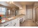 Elegant bathroom with granite countertops and double sinks at 17395 Leisure Lake Dr, Monument, CO 80132