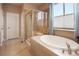 Spa-like bathroom with soaking tub and walk-in shower at 17395 Leisure Lake Dr, Monument, CO 80132