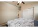 Bedroom with a queen bed and access to hallway at 17395 Leisure Lake Dr, Monument, CO 80132