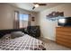 Bright bedroom with a double bed, desk, and TV at 17395 Leisure Lake Dr, Monument, CO 80132