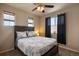 Comfortable bedroom with a queen-size bed and window at 17395 Leisure Lake Dr, Monument, CO 80132